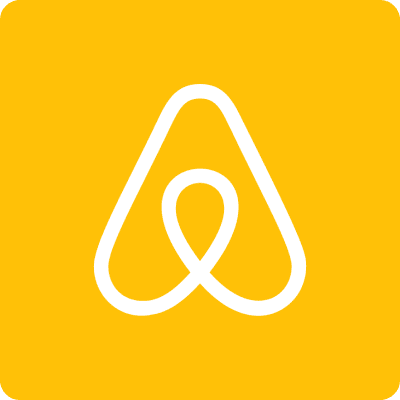 Yellow background with white abstract logo.